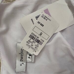 Neiman Marcus White Jumpsuit or Romper - 5 twelve tag visible